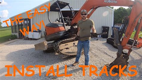 mini excavator turf tracks|installing track on mini excavator.